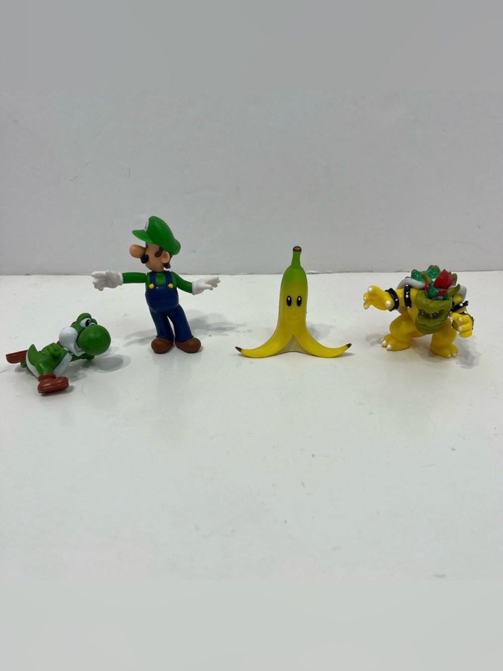 NINTENDO SUPER MARIO BROS mini figures banana peel bowser Luigi yoshi